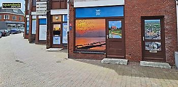 div leegstaande panden voorzien van full colour prints  gemeente Delfzijl - Spandoekstore.com reclameuitingen